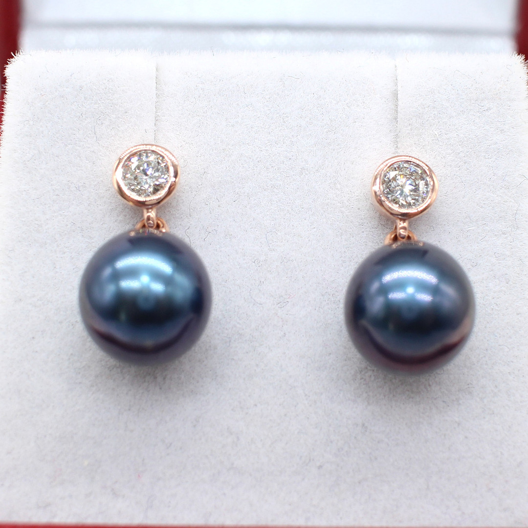 IRIDESCENT PEARL & DIAMOND EARRINGS.