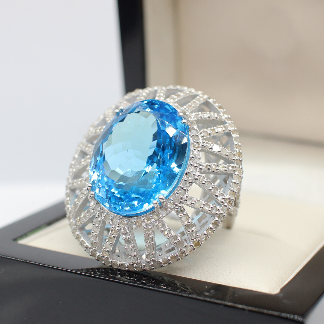 LARGE BLUE TOPAZ & DIAMOND DRESS RING.