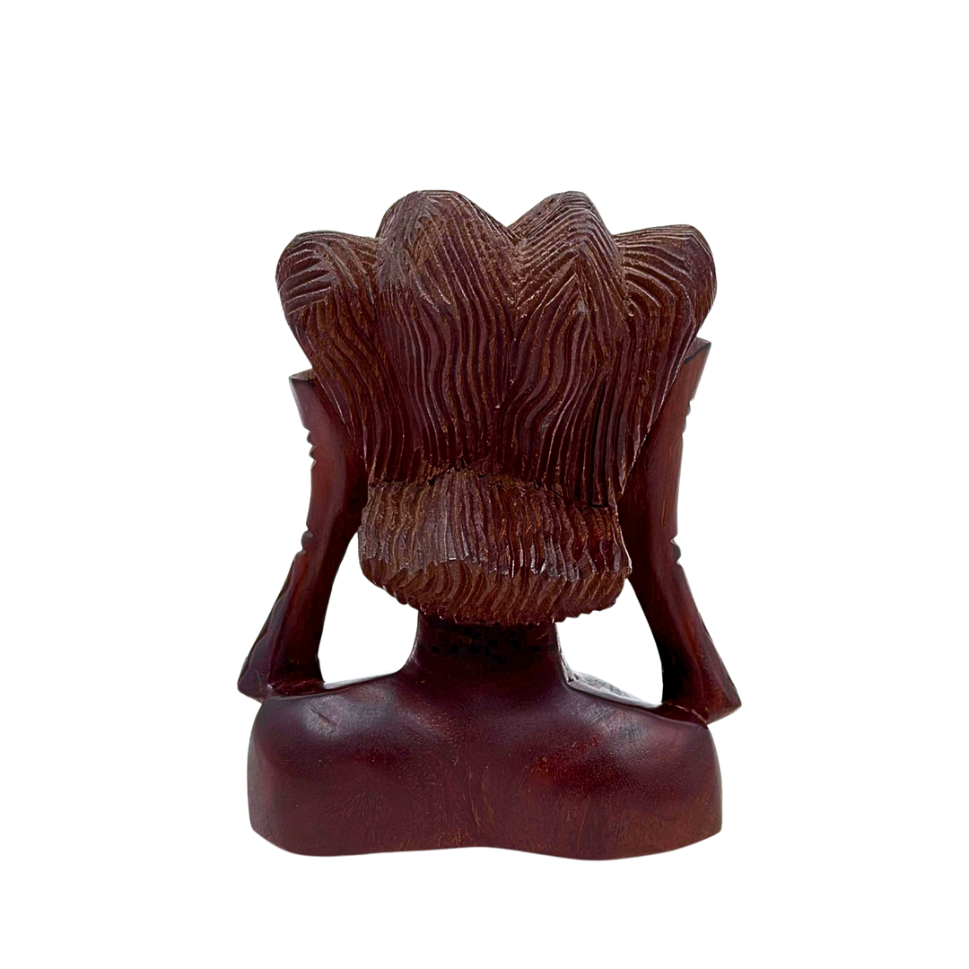 AFRIKANISCHE HOLZSKULPTUR EINES FRAUENKOPFES AUS DUNKLEM HARTHOLZ.