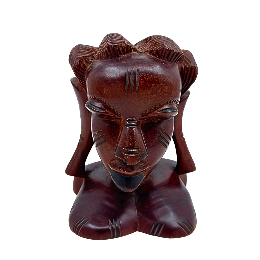 AFRIKANISCHE HOLZSKULPTUR EINES FRAUENKOPFES AUS DUNKLEM HARTHOLZ.
