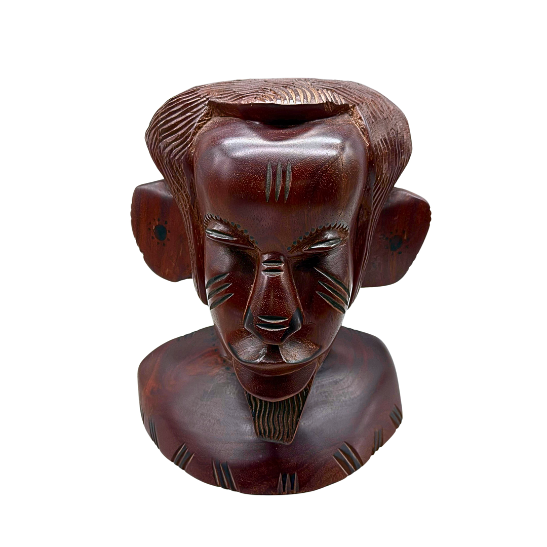AFRIKANISCHE HOLZSKULPTUR EINES MÄNNERKOPFES AUS DUNKLEM HARTHOLZ.