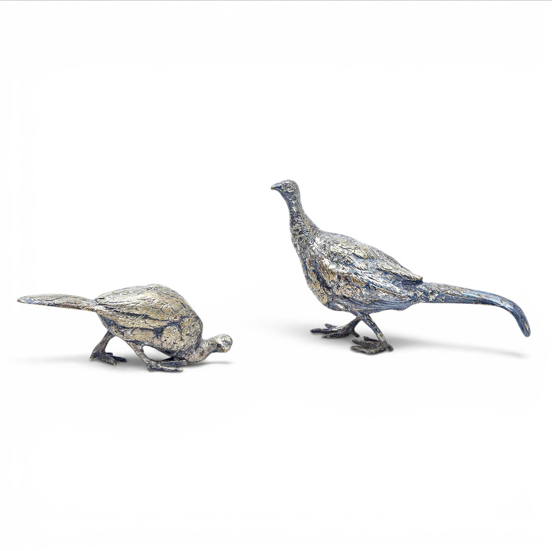Two silvery metal small pheasants, 20th Century.