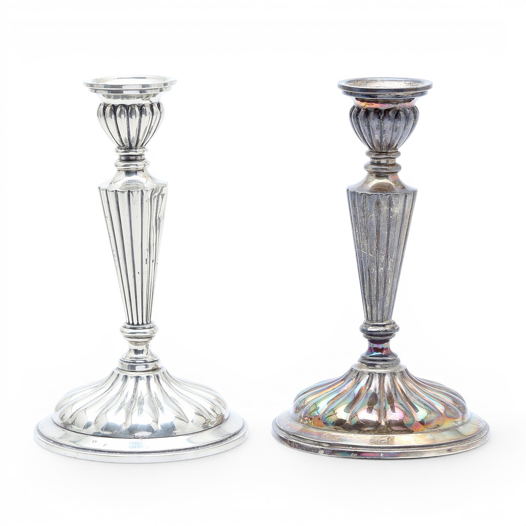 Pair of silver candlesticks, 20th Century.