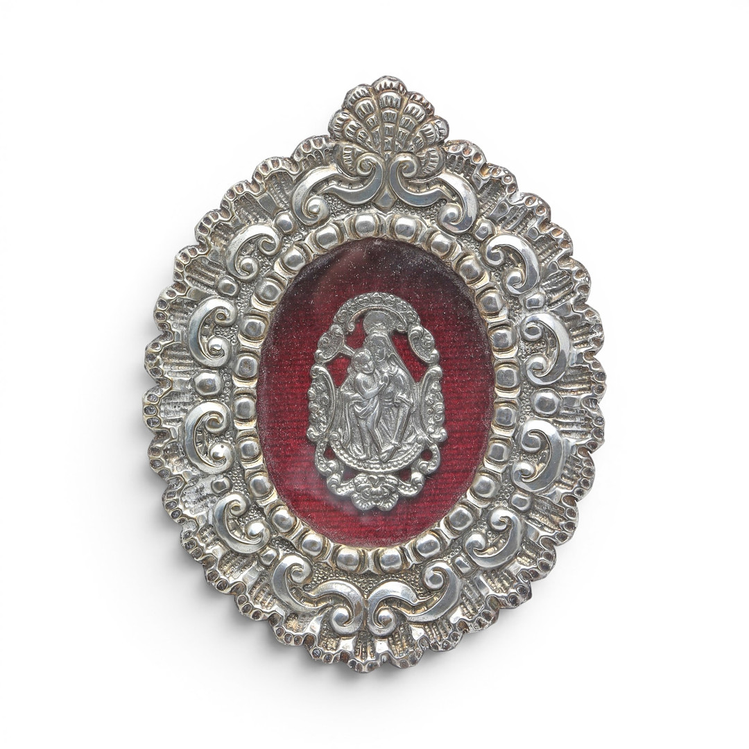 Blessing stoup and Madonna and Child in silver and silvery metal, 20th Century.