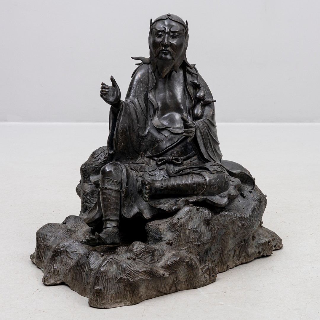 SKULPTUR, daoistisk gudom möjligen avbildande Shennong . patinerad metall, sen Qing.