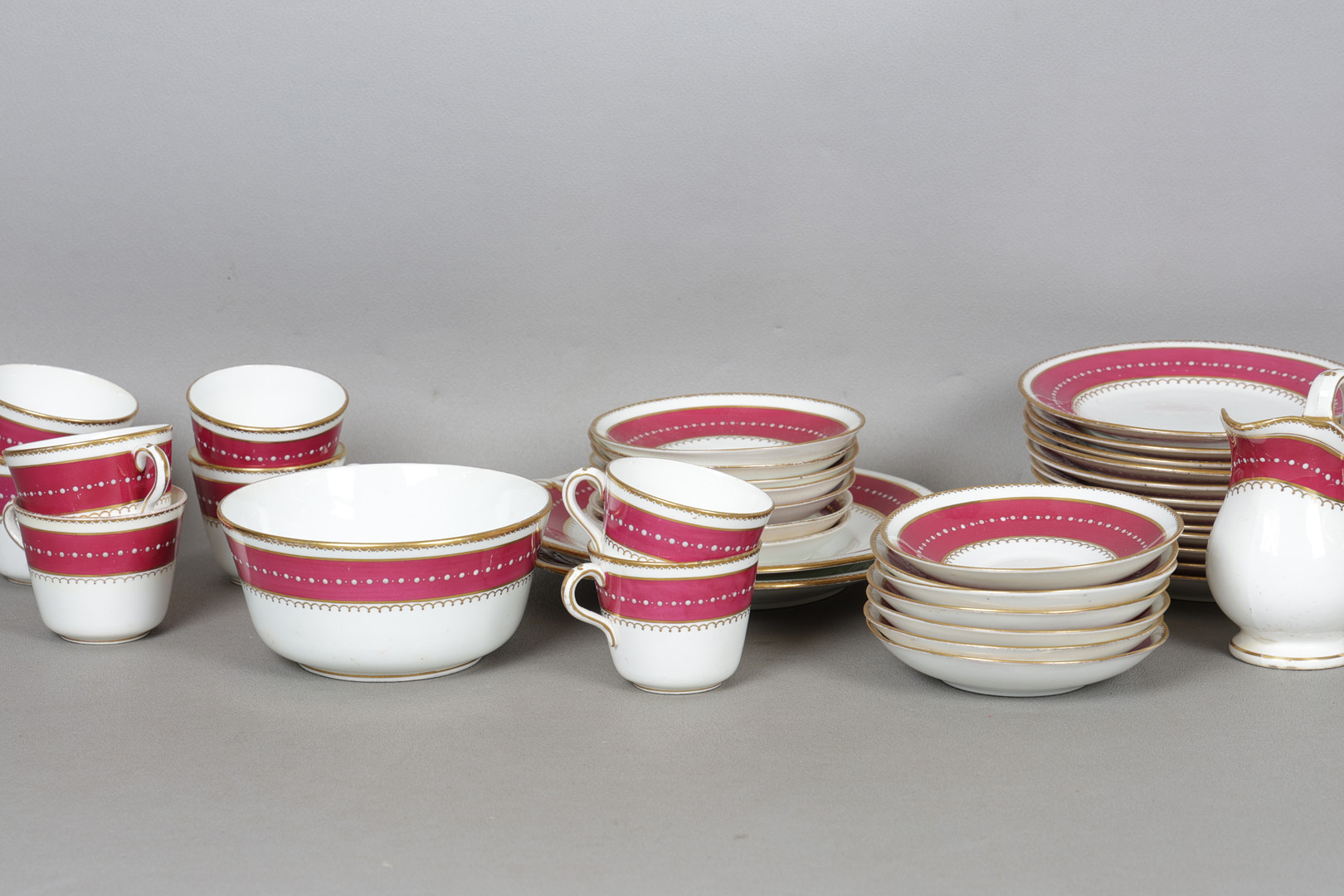 A MATCHED STAFFORDSHIRE PORCELAIN PART TEA-SET (39).