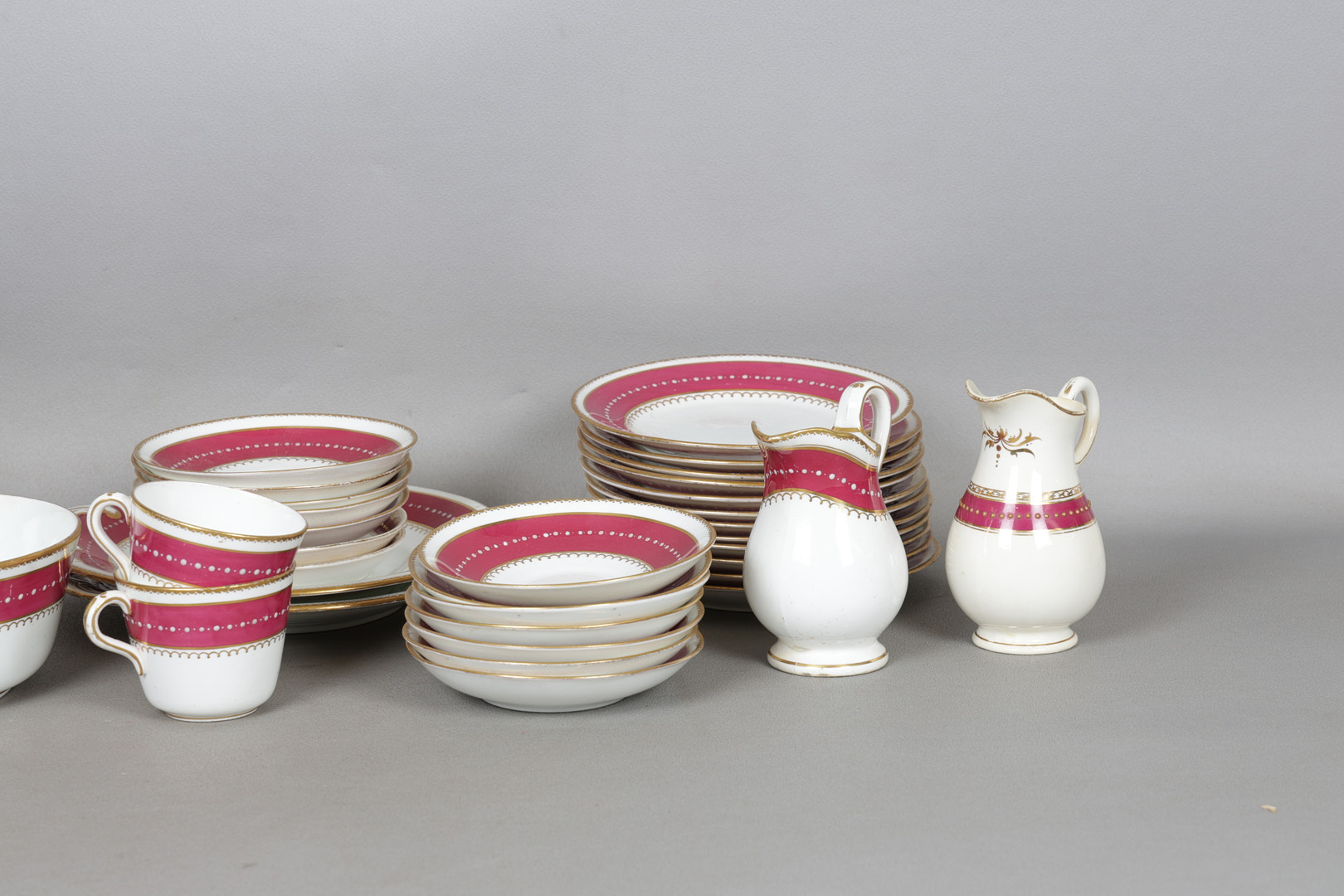 A MATCHED STAFFORDSHIRE PORCELAIN PART TEA-SET (39).