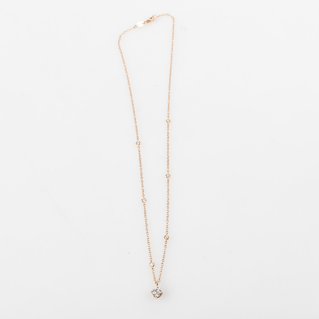 COLLIER 18K roséguld med briljantslipade diamanter totalt ca 0.75 ct.