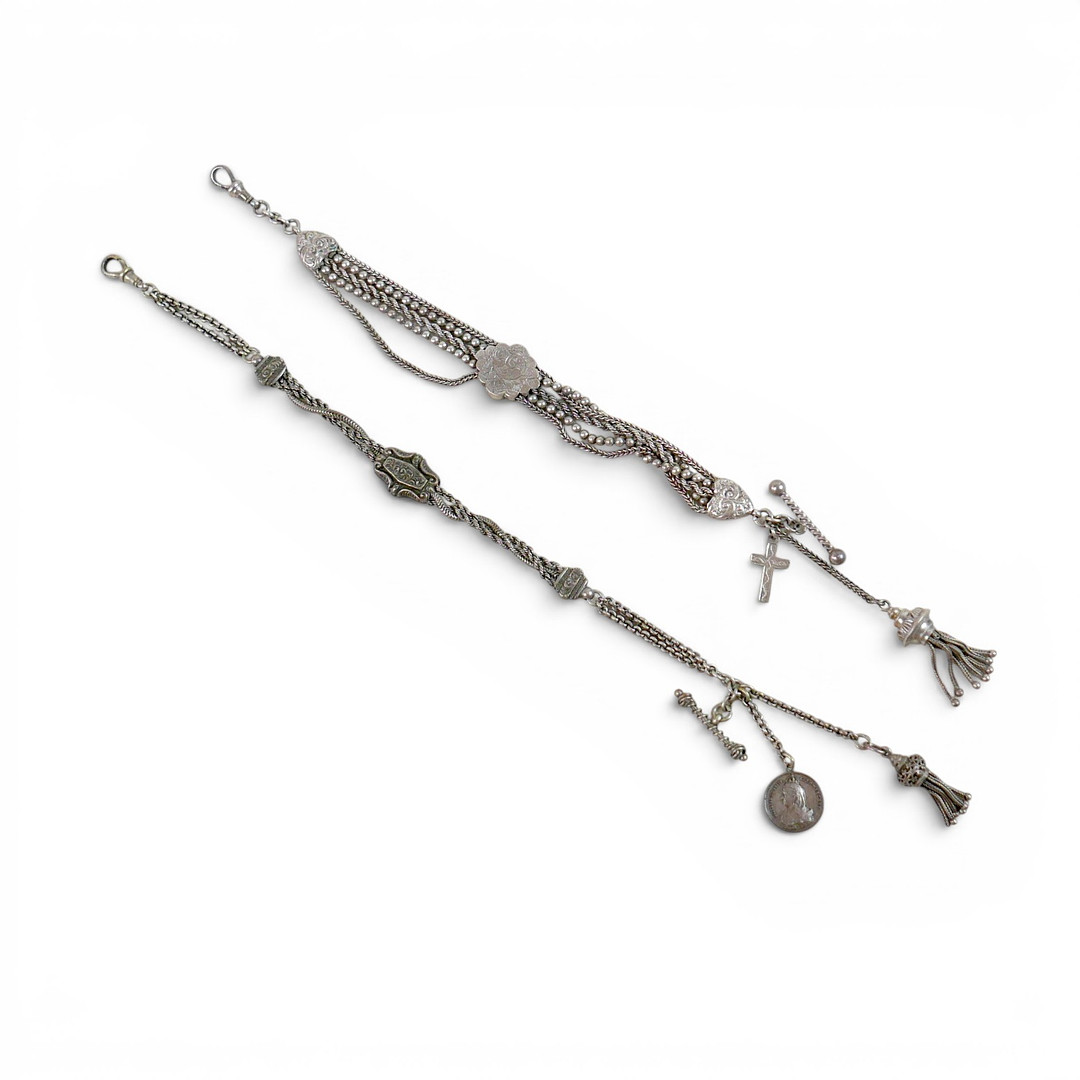 TWO WHITE METAL ORNATE WATCH CHAINS.