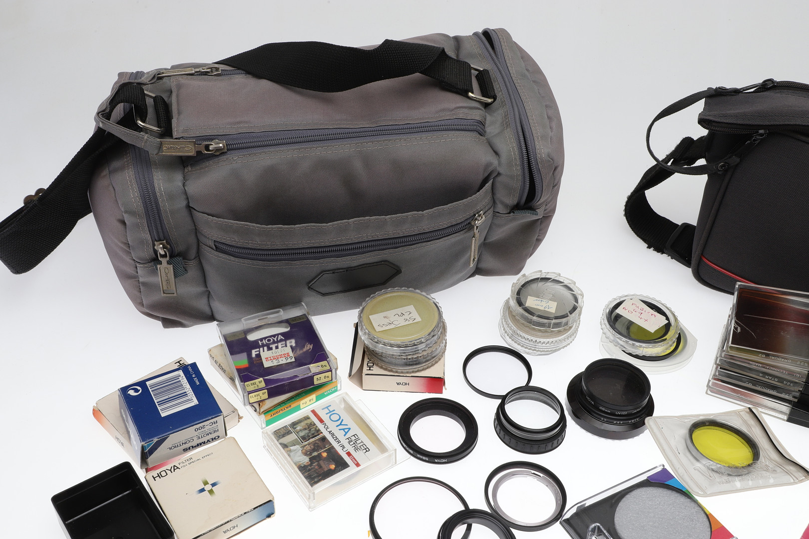 LARGE COLLECTION OF CAMERA LENS FILTERS.