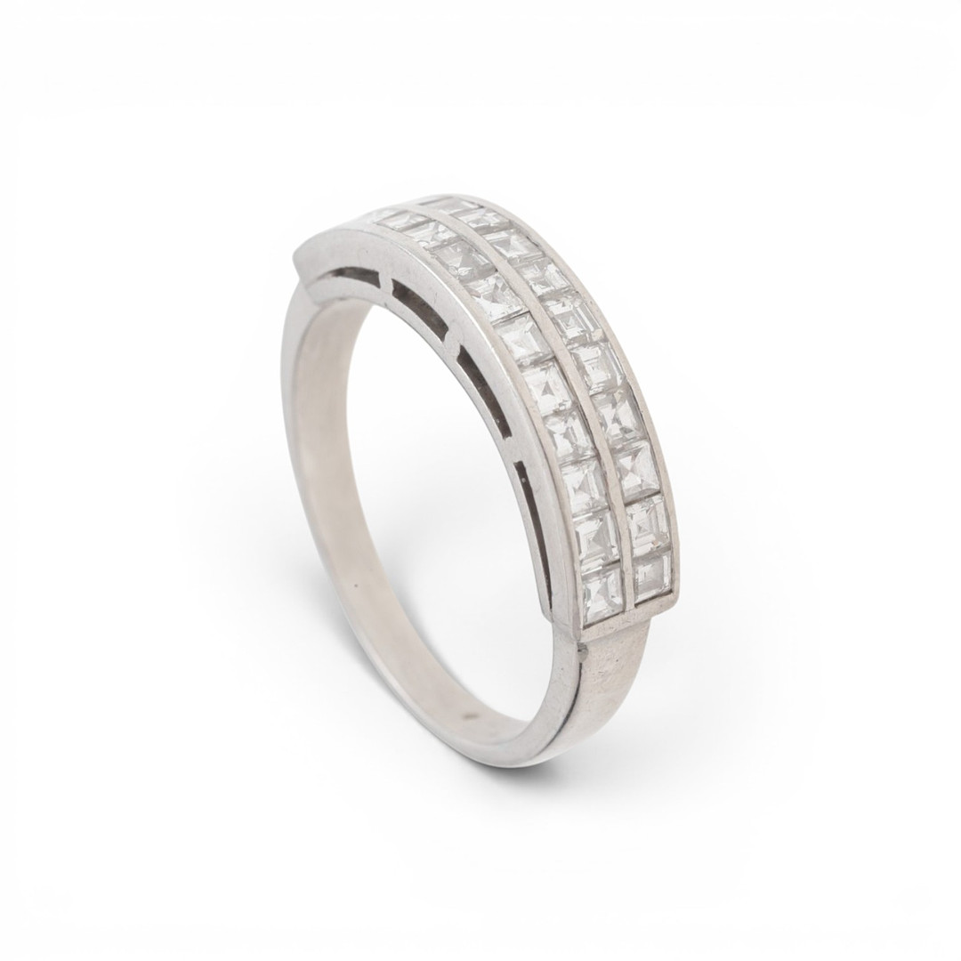 Double half-eternity diamond ring.