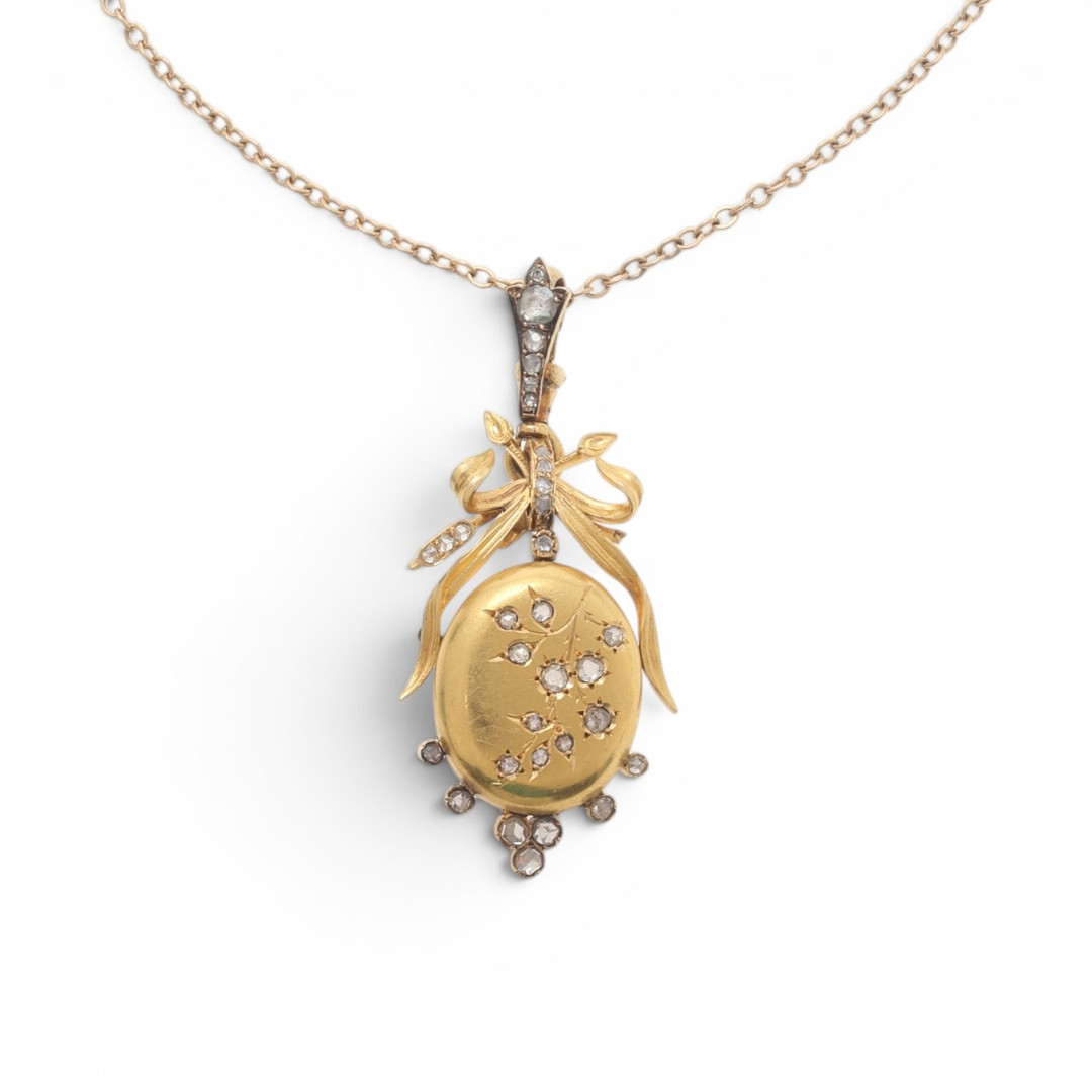 Floral motif pendant in gold and diamonds, late 19th century.