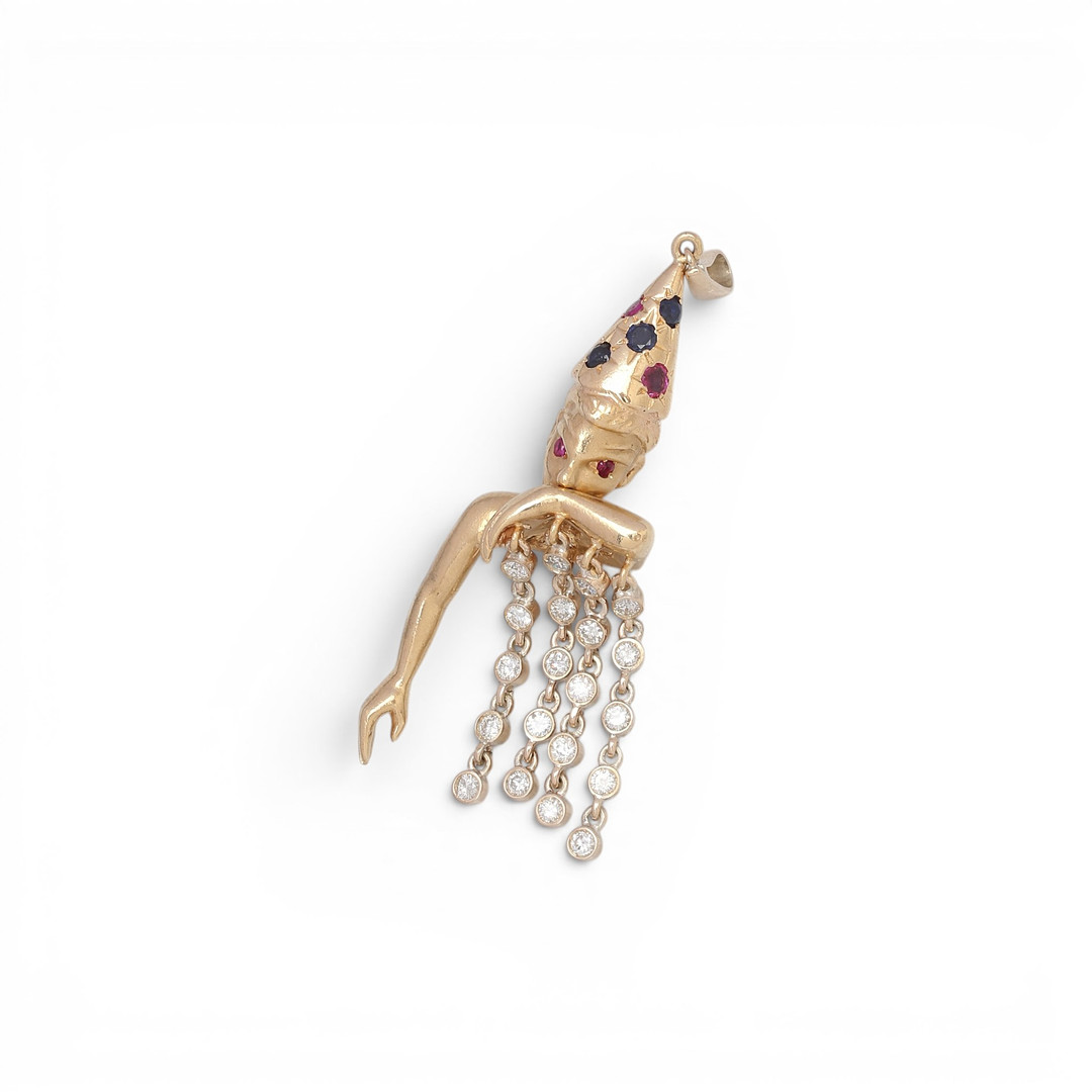 Harlequin-shaped pendant in gold and gemstones.