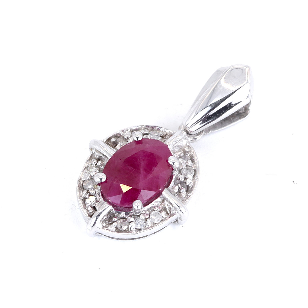 9CT WHITE GOLD RUBY & DIAMOND PENDANT.
