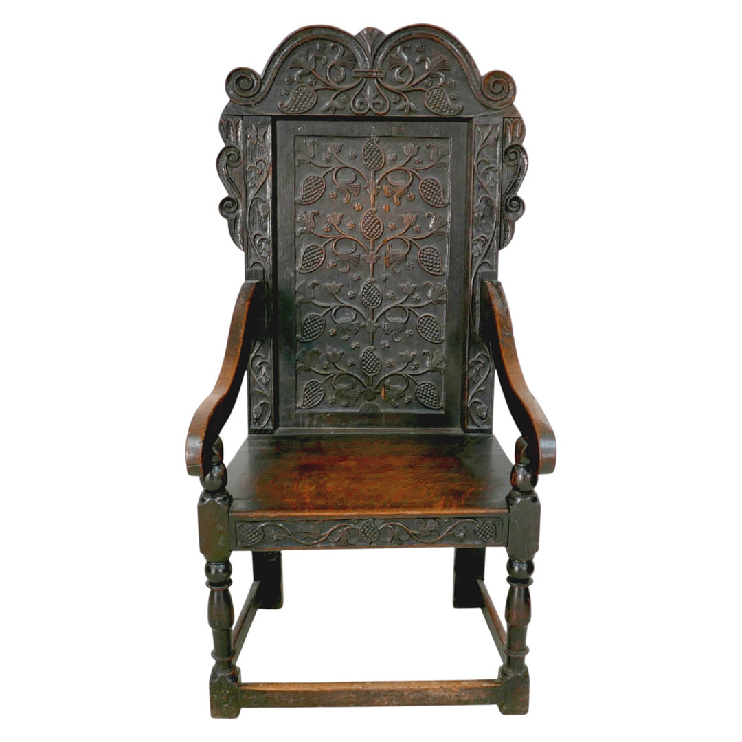AN 18TH CENTURY OAK WAINSCOT CHAIR WITH PROVENANCE.