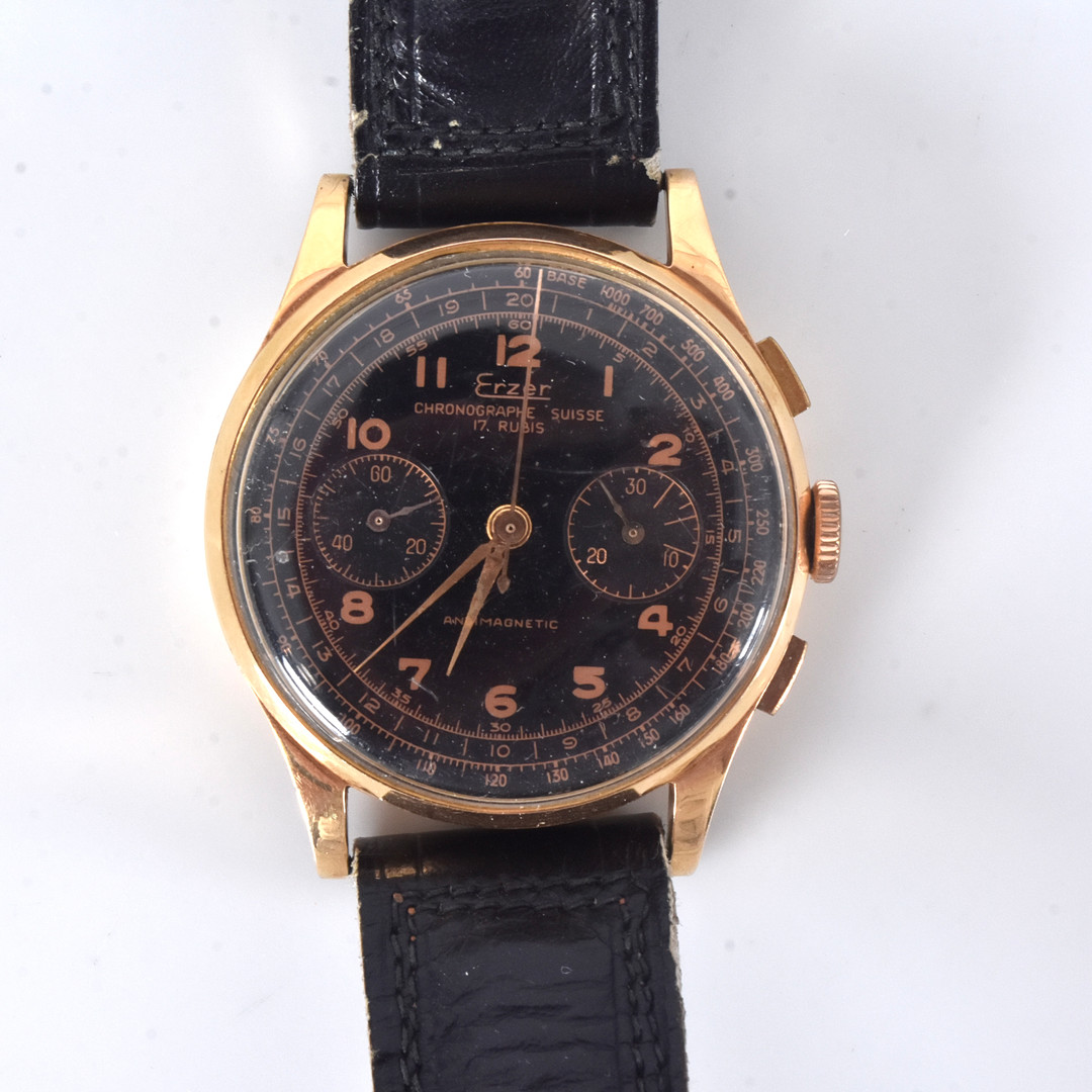 HERRARMBANDSUR, Erzer Chronographe Suisse 18K.