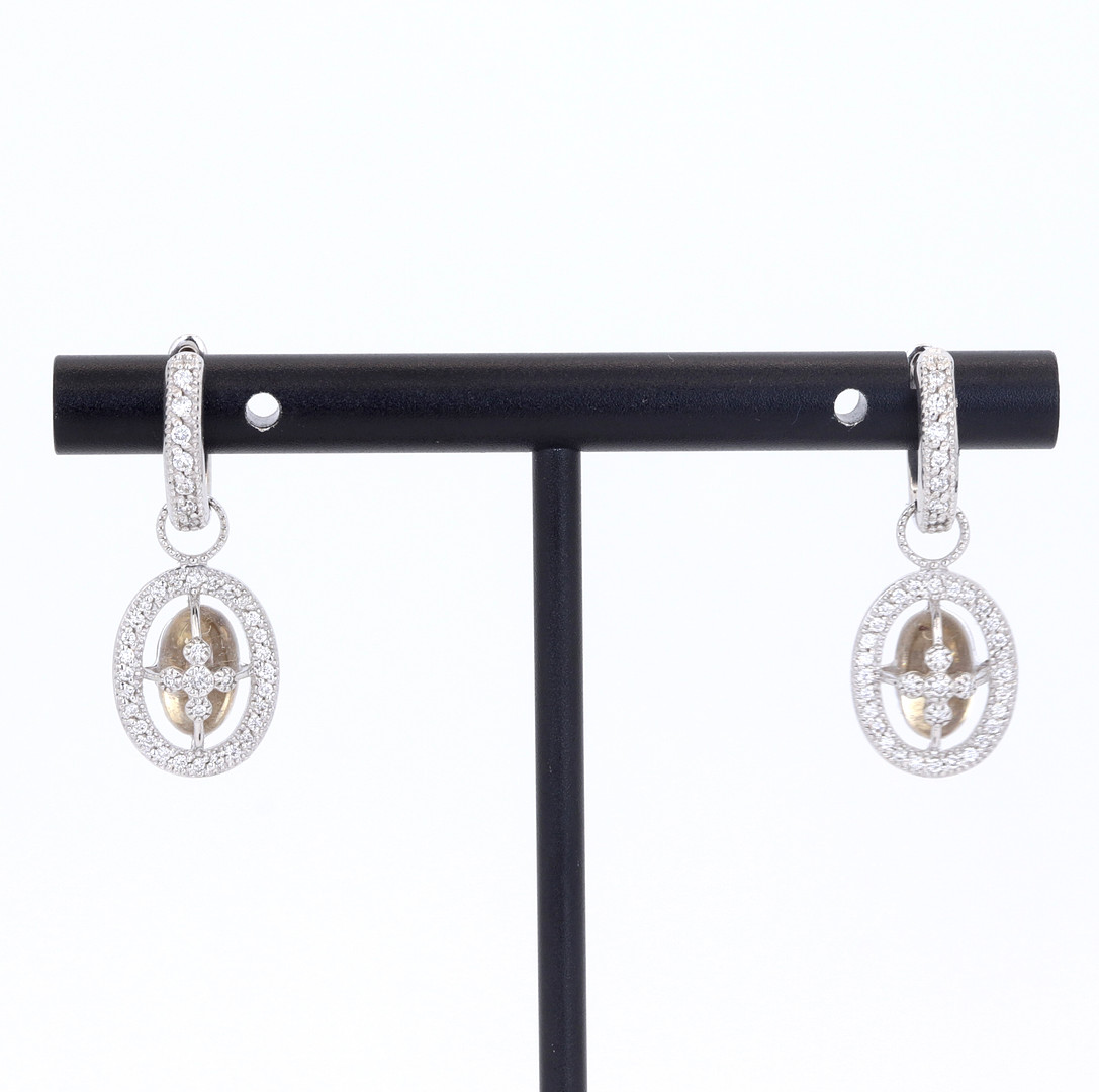 9CT WHITE GOLD DIAMOND SET DROP EARRINGS.