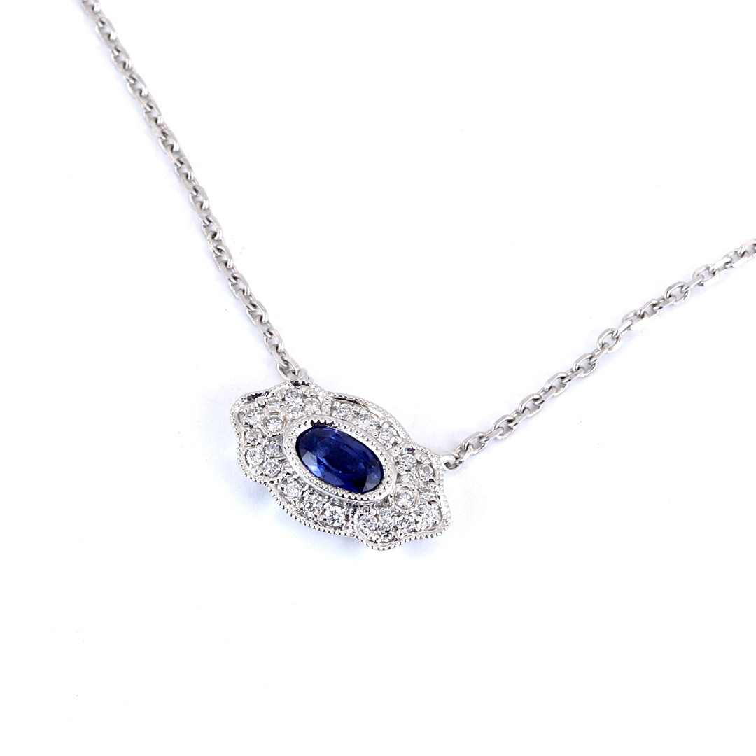 18CT WHITE GOLD SAPPHIRE & DIAMOND SET NECKLACE.