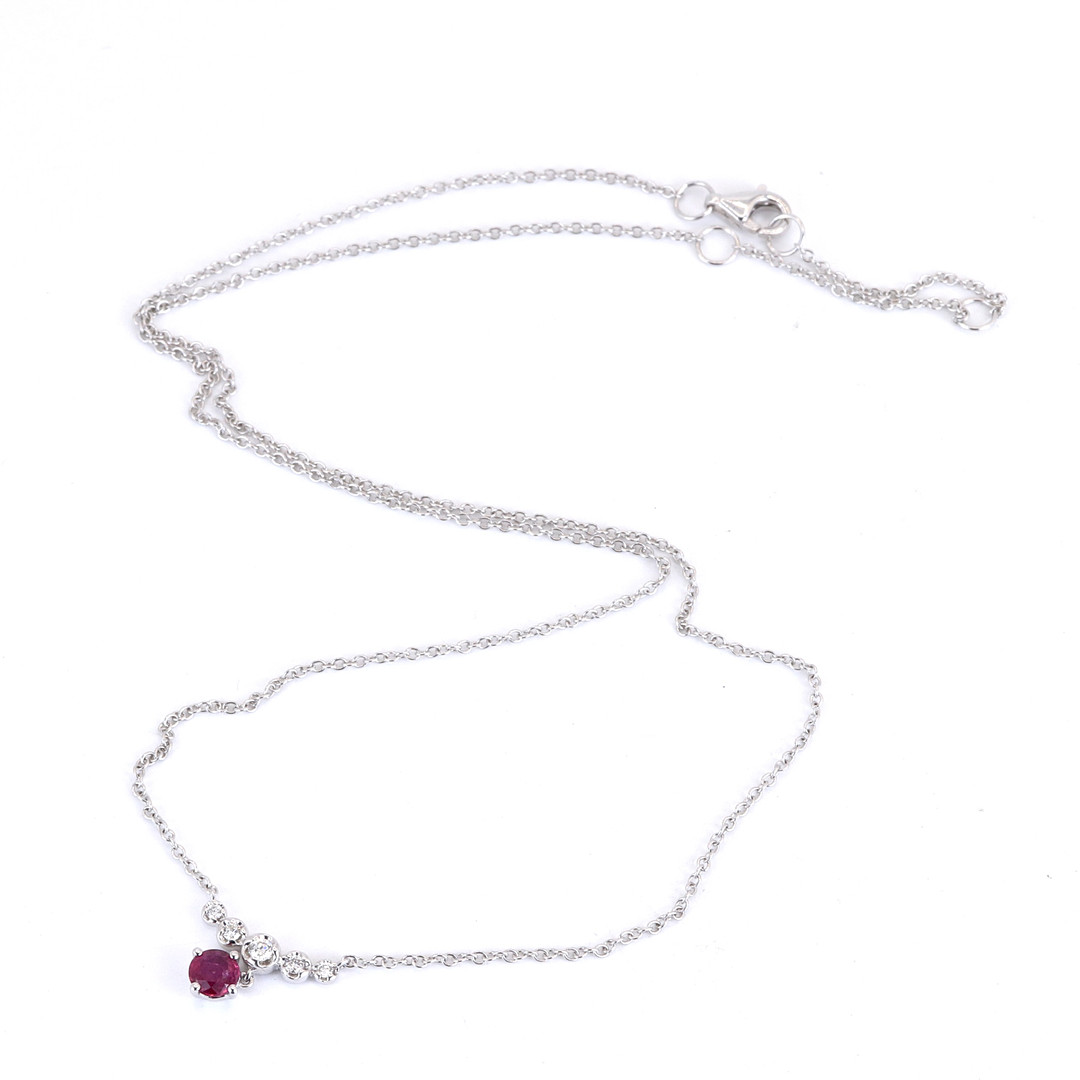 18CT RUBY AND DIAMOND NECKLACE.