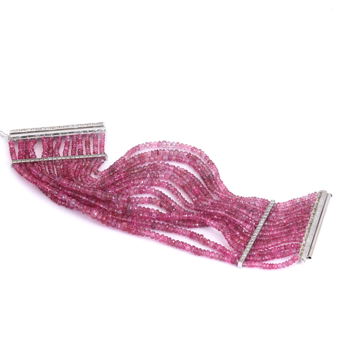 18CT PINK TOPAZ & DIAMOND BRACELET.