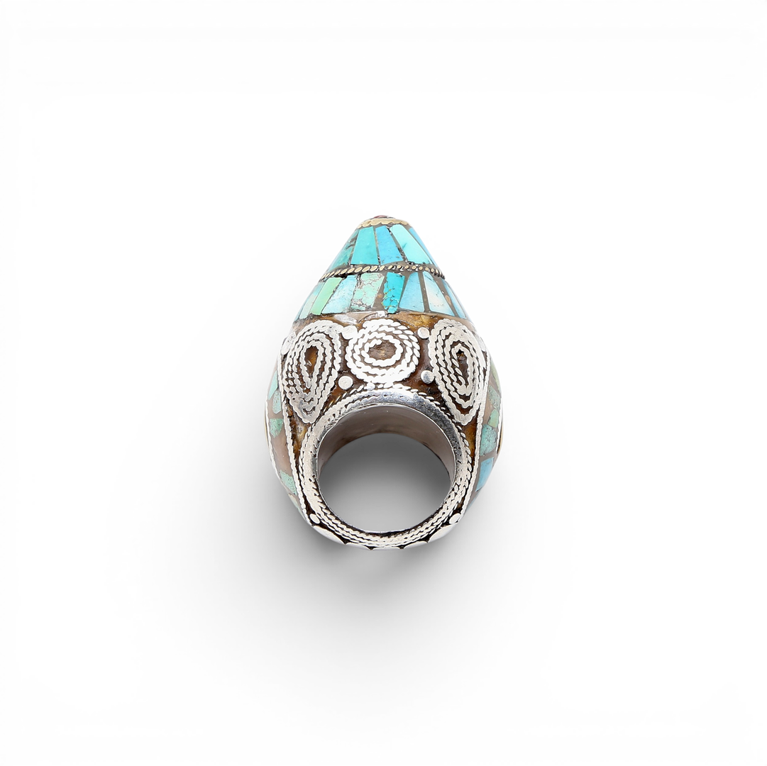Probably Turkish silver ring with turquoise simile, coral simile and enamel, 20th Century.