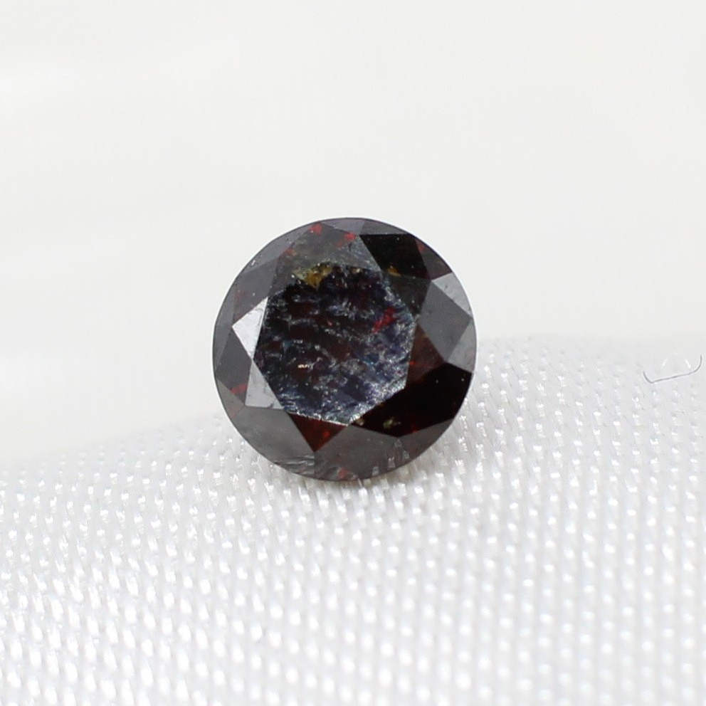 LOOSE ORANGE/BROWN DIAMOND 0.59CT.