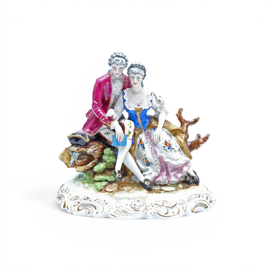 "18th Century-like couple", German porcelain group, 20th Century.