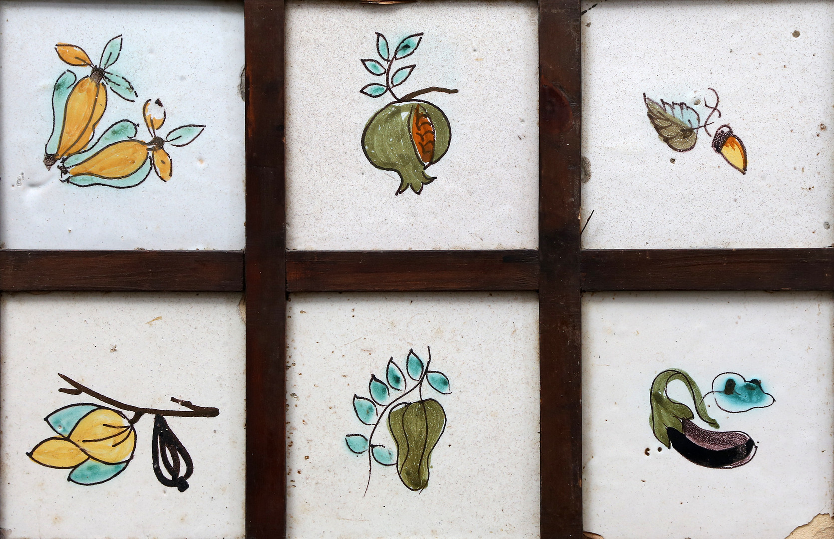 Panel of six 19th century Catalan fruit tiles.