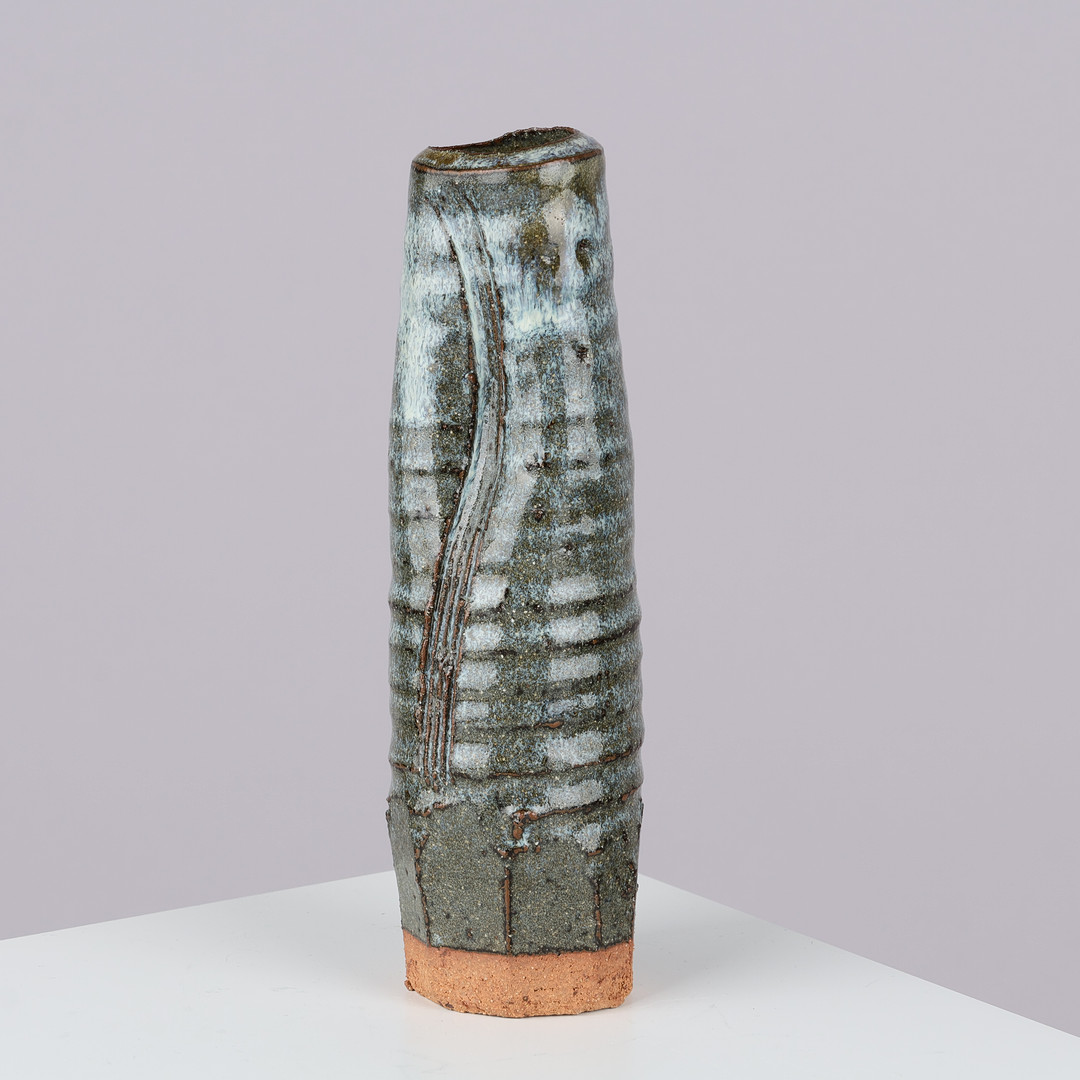 Slender and stamped stoneware vase, possibly of Japanese origin, 20th century.