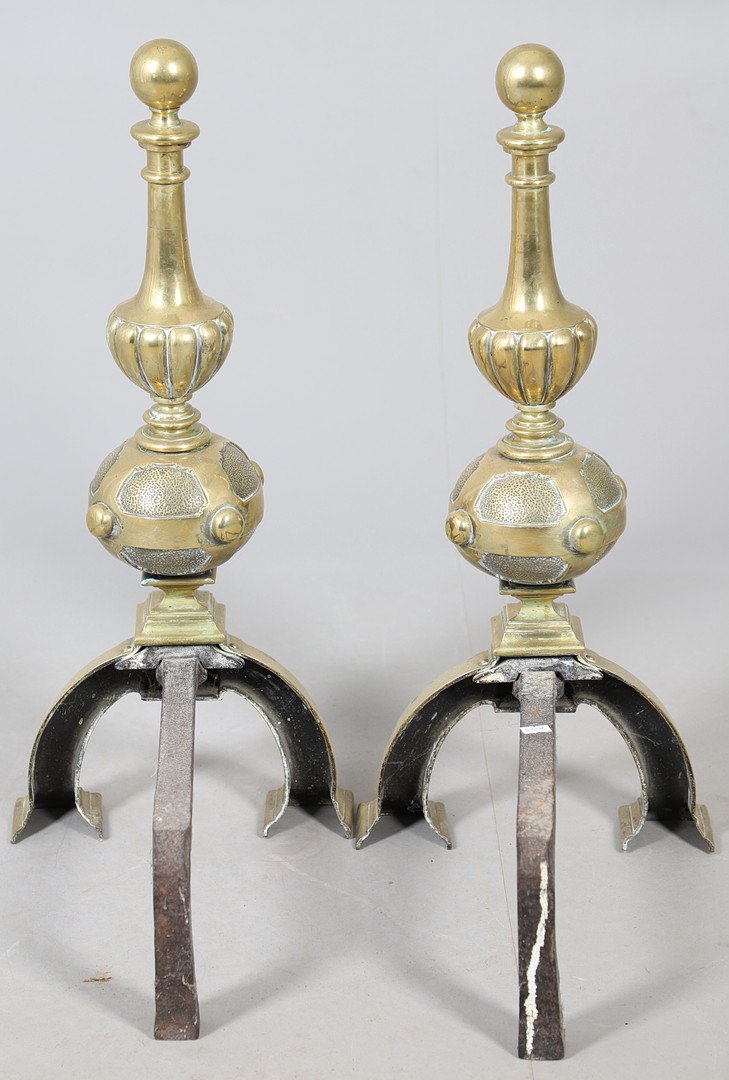 A PAIR OF BRASS ANDIRONS.