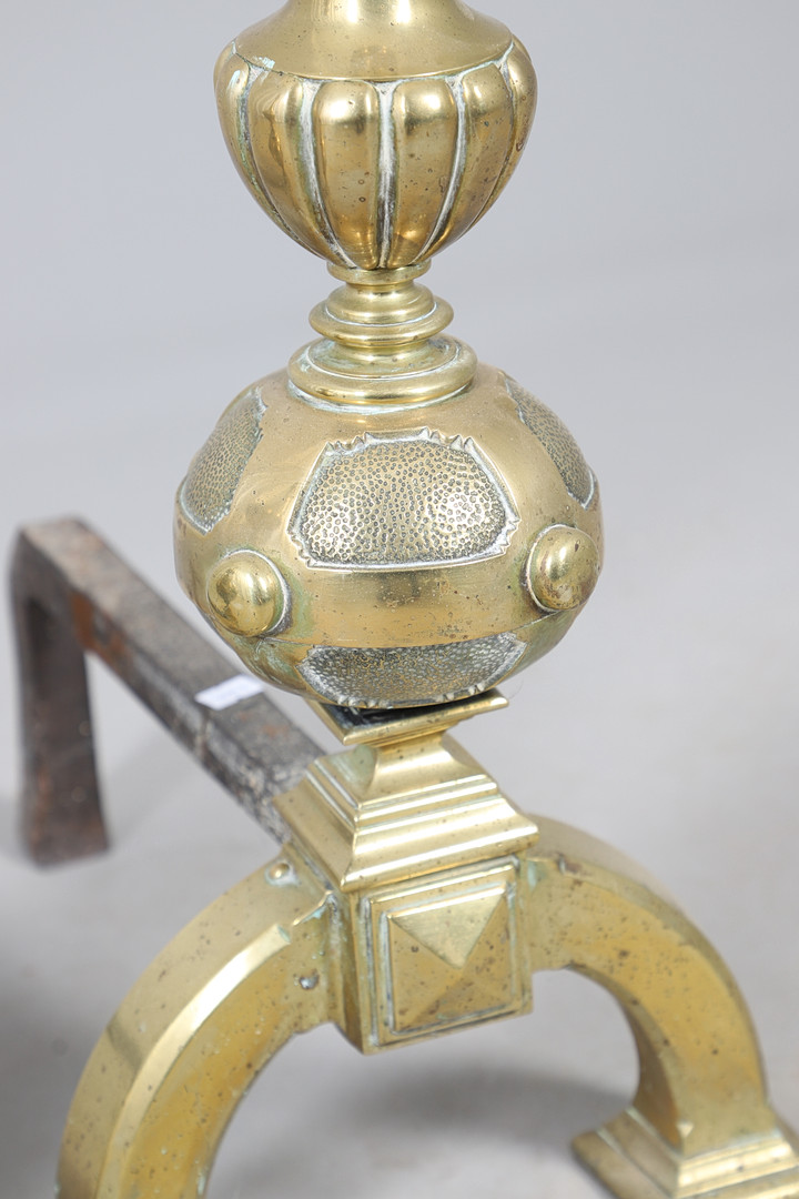 A PAIR OF BRASS ANDIRONS.