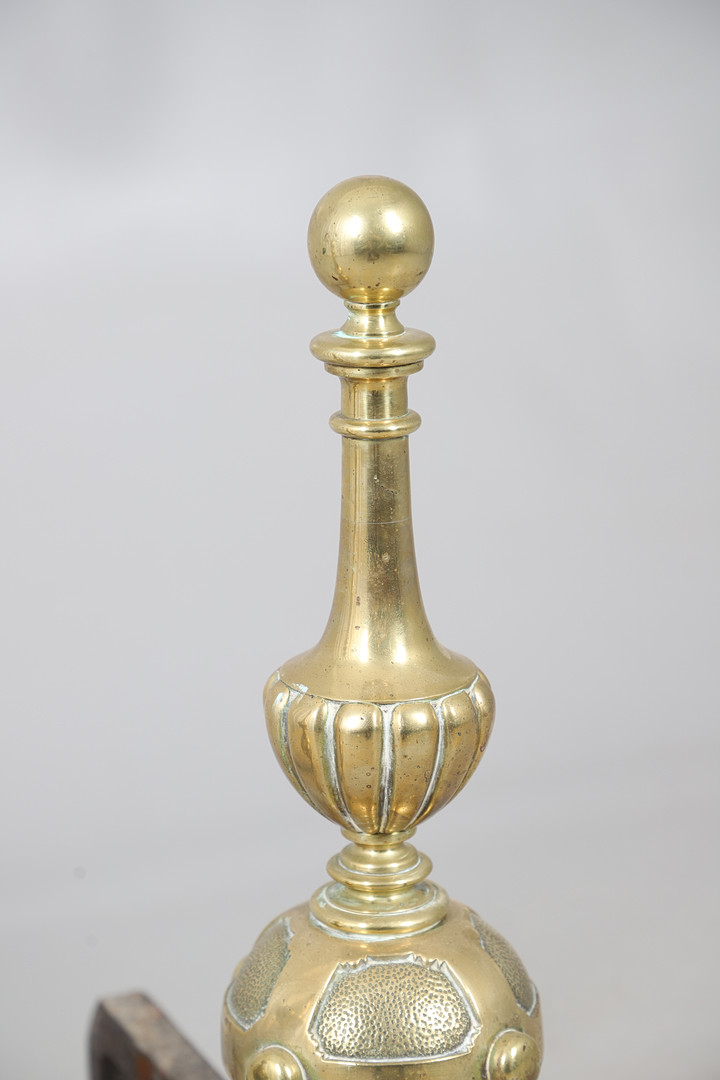 A PAIR OF BRASS ANDIRONS.