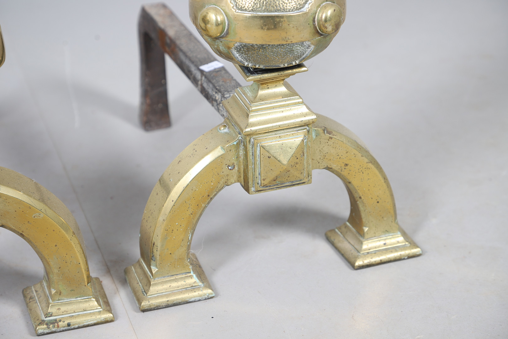 A PAIR OF BRASS ANDIRONS.