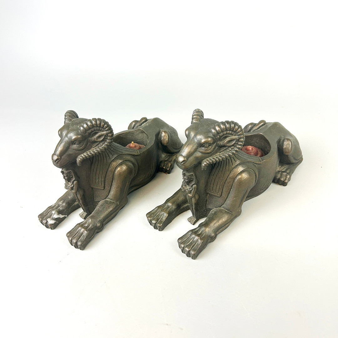 RESIN RAM CANDLE HOLDERS.