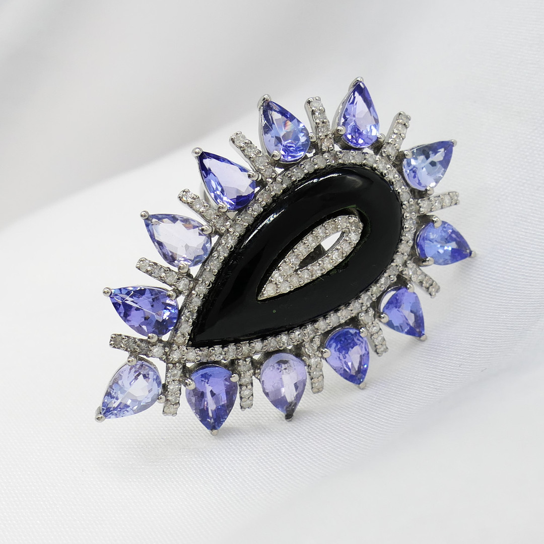 ONYX, TANZANITE & DIAMOND dress ring.