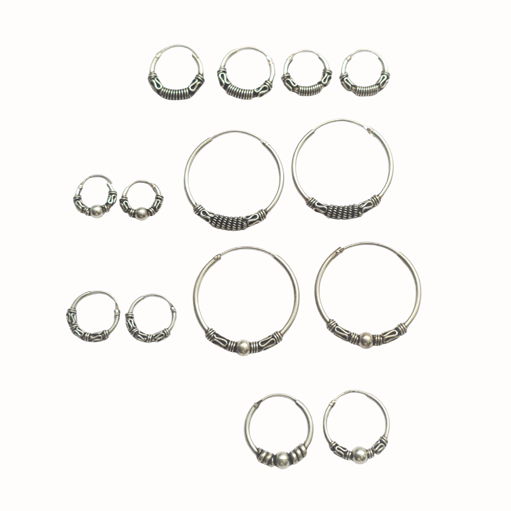 7 pares de pendientes en plata.