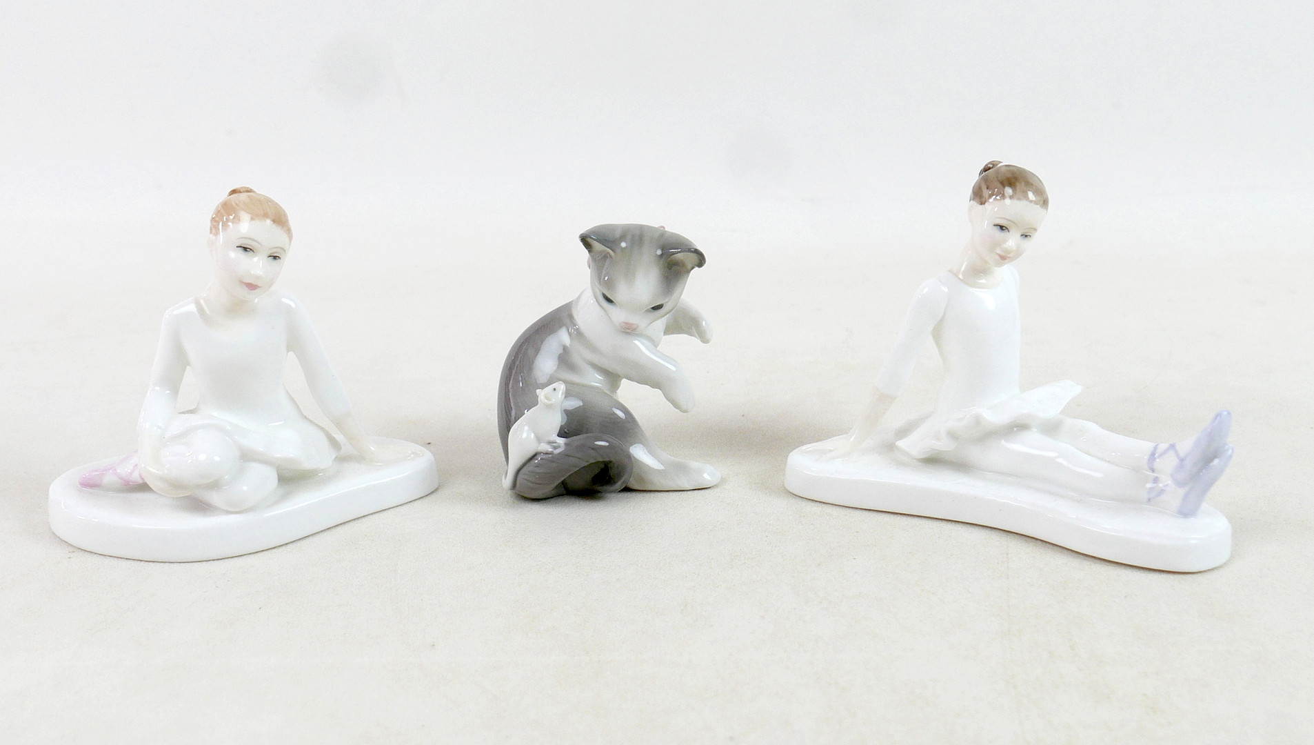 FIVE ROYAL DOULTON AND LLADRO FIGURINES.