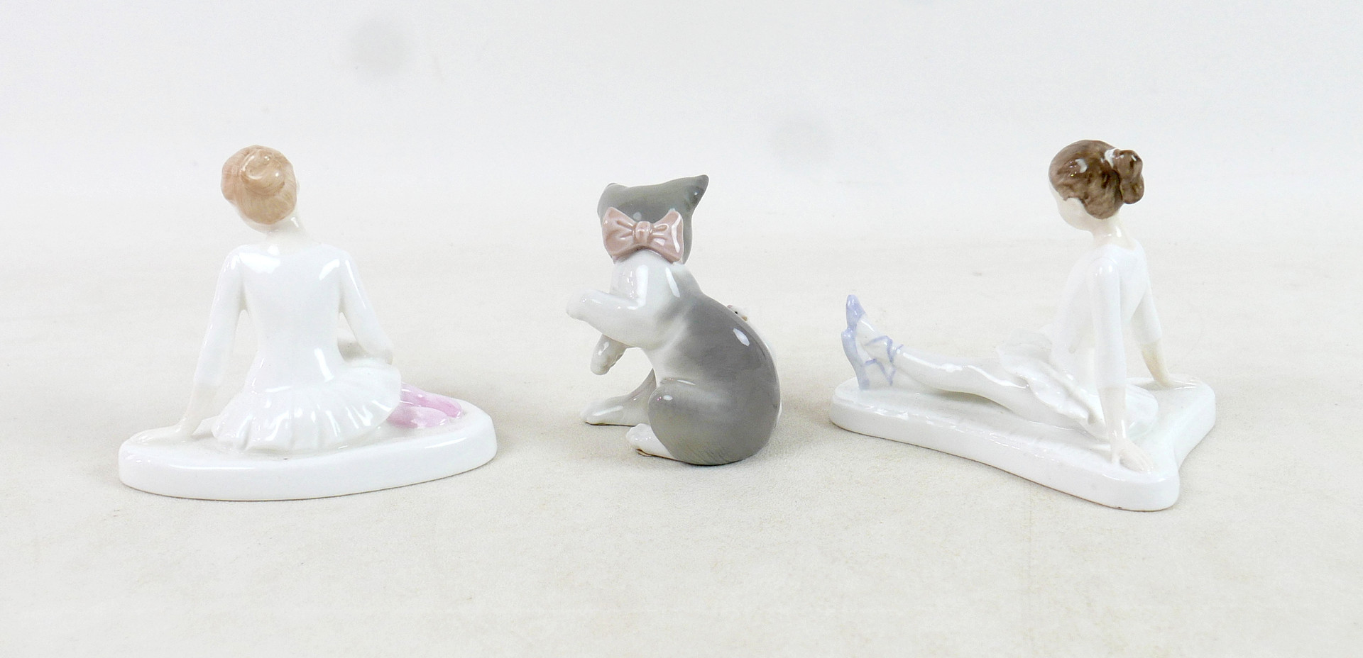 FIVE ROYAL DOULTON AND LLADRO FIGURINES.