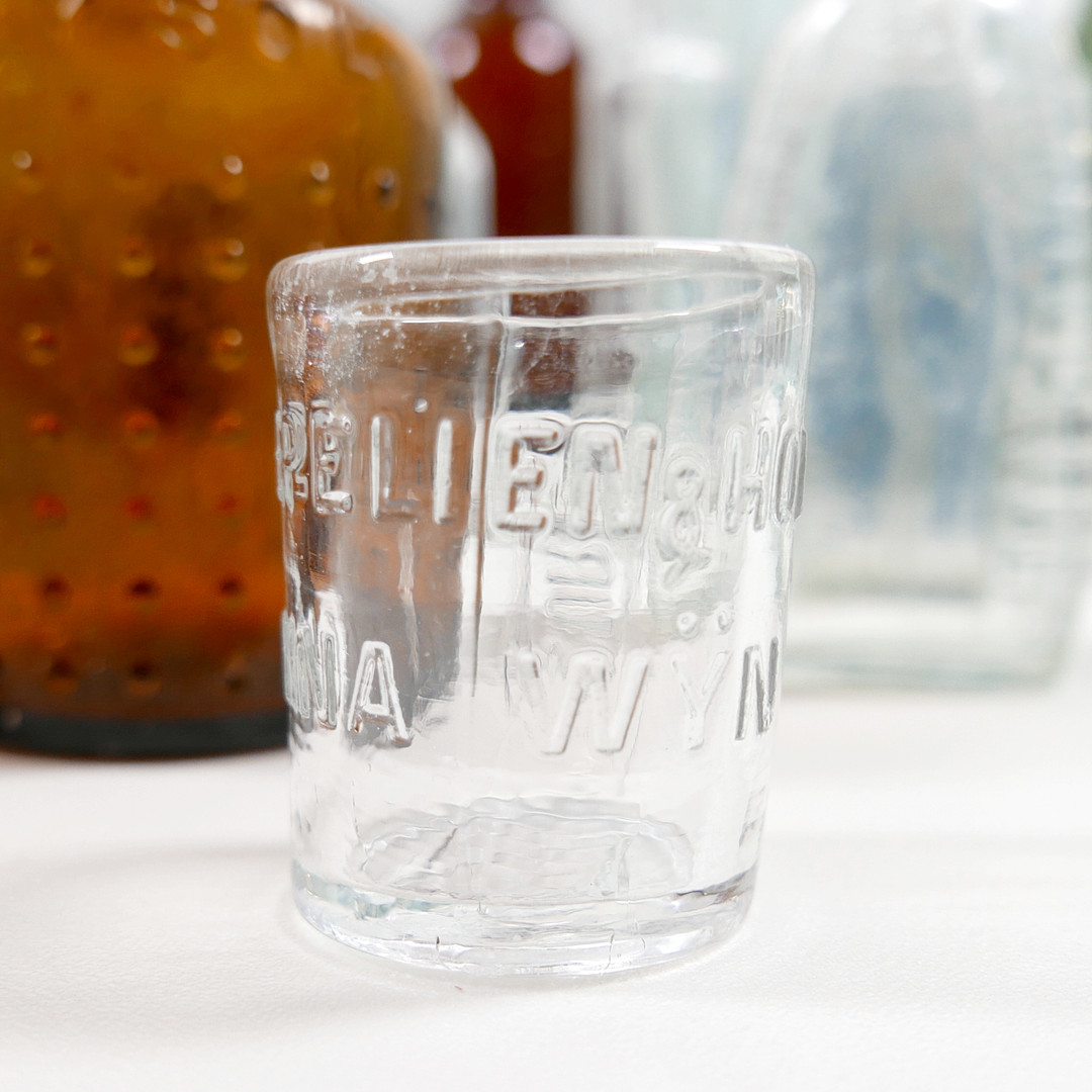 THIRTY-SIX VINTAGE GLASS BOTTLES AND CONTAINERS.