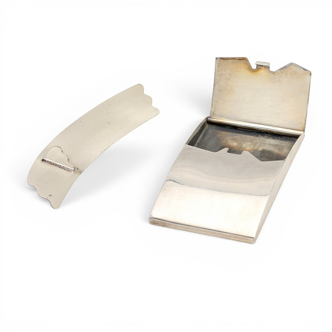 Various silver objects.