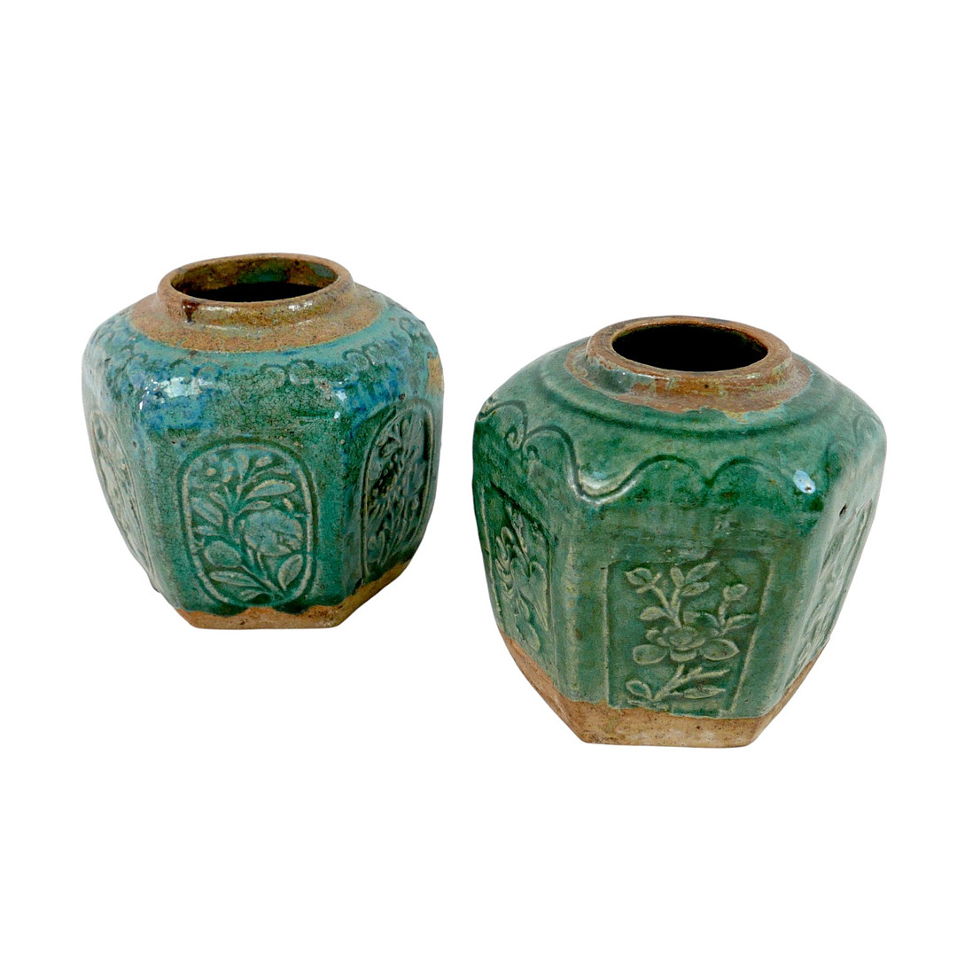 A PAIR OF 19TH CENTURY CHINESE GREEN GLAZED STONEWARE GINGER JARS.