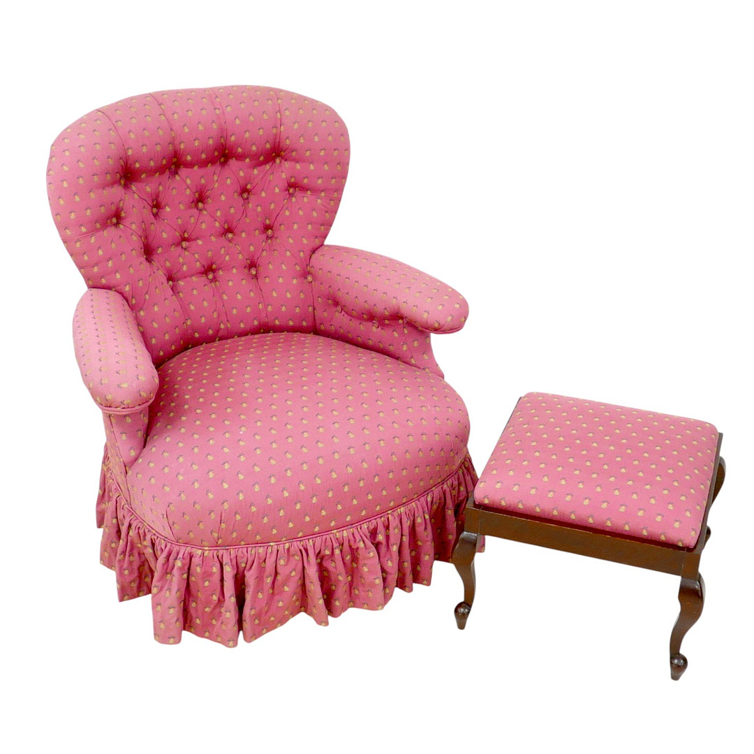 A LATE 20TH CENTURY ARMCHAIR AND FOOT STOOL.
