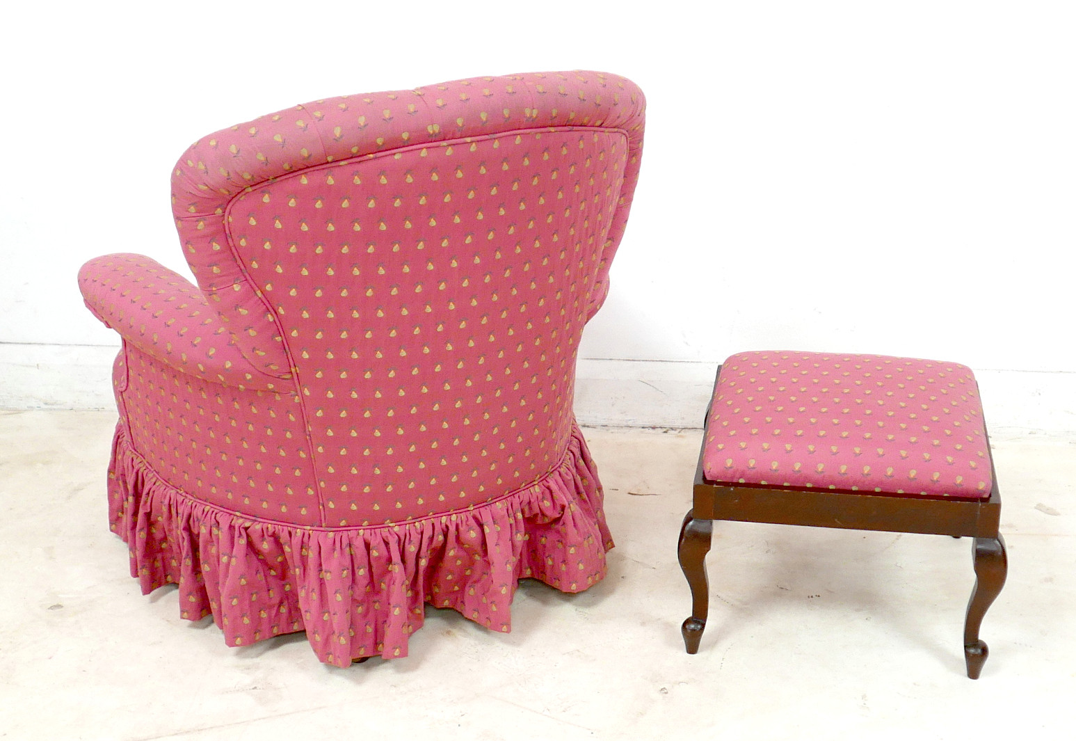 A LATE 20TH CENTURY ARMCHAIR AND FOOT STOOL.