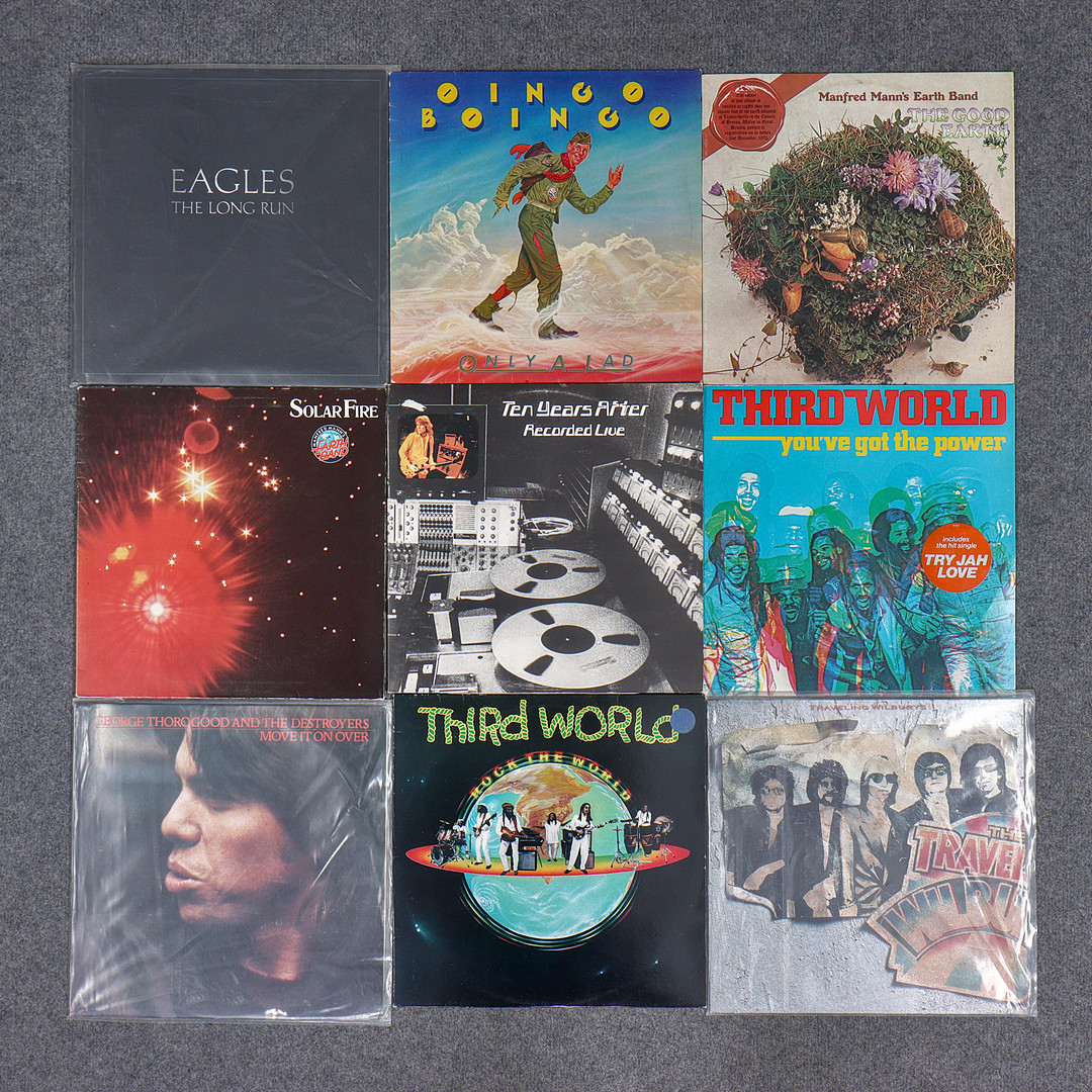 9 LP-SKIVOR, EAGLES, TRAVELING WILDBURYS, GEORGE THOROGOOD, THIRD WORLD, MANFRED MANN'S EARTHBAND, TEN YEARS AFTER, OINGO BOINGO.