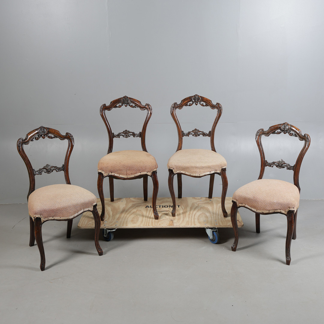 A SET OF FOUR VICTORIAN WALNUT DINING CHAIRS (4).