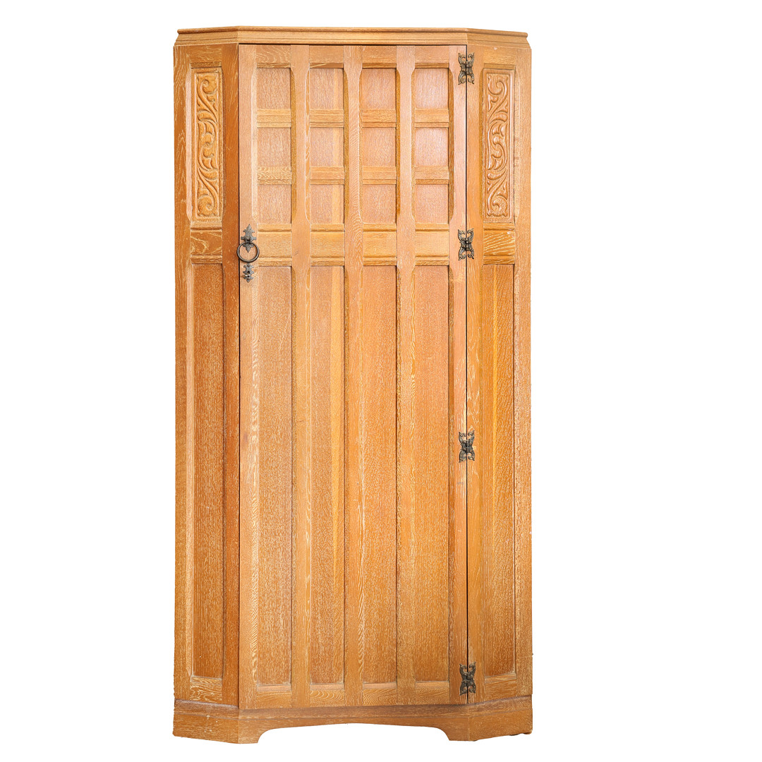 A LIGHT OAK WARDROBE.