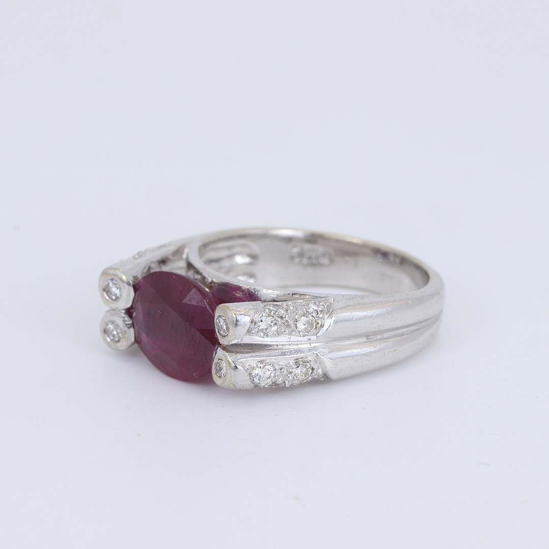 18CT RUBY AND DIAMOND RING.