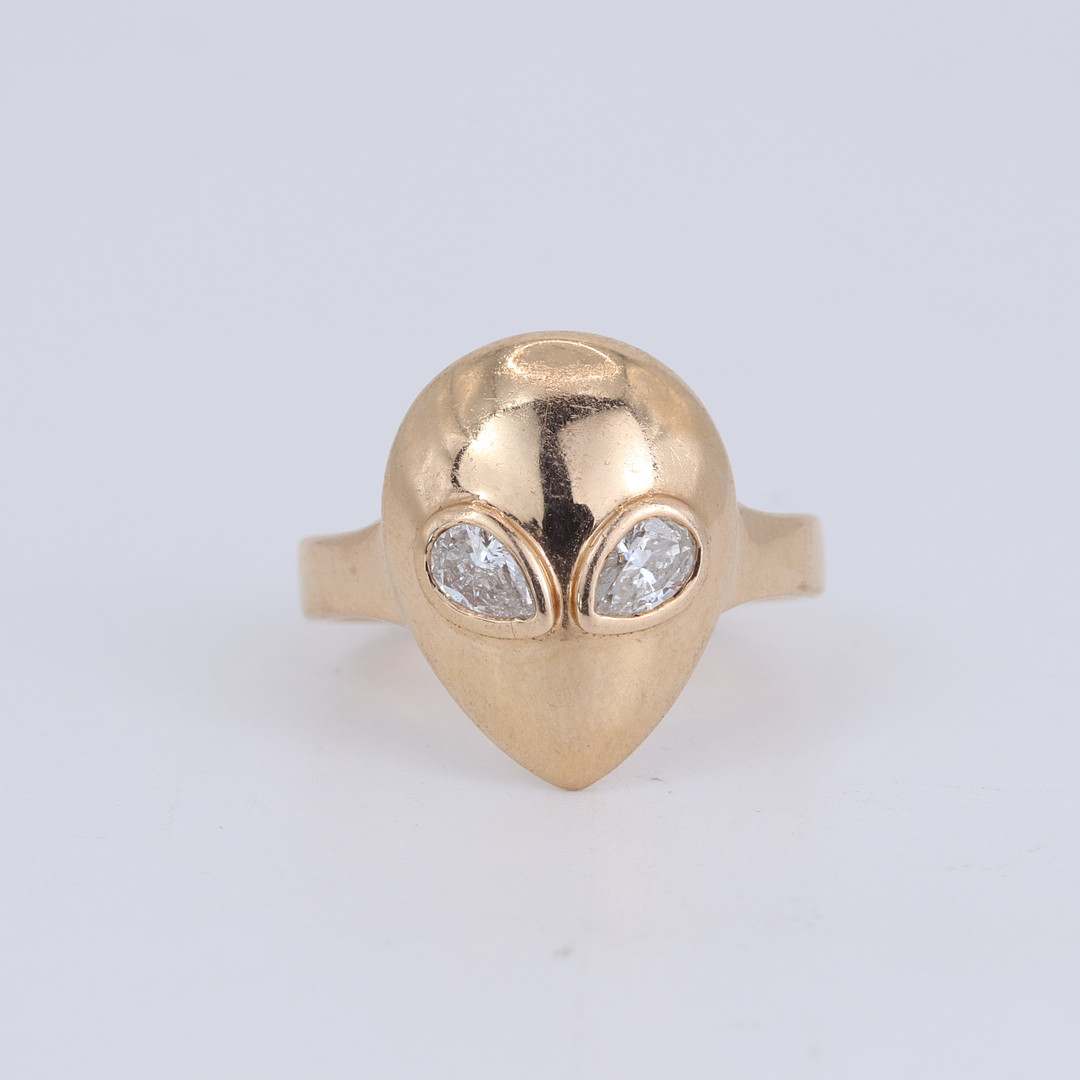 14CT ROSE GOLD DIAMOND RING.