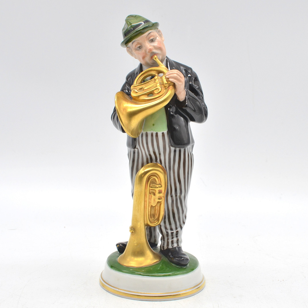 CARL HIMMELSTOSS. ROSENTHAL GERMANY (SELB), DER HORNBLÄSER, PORZELLAN, HANDBEMALT, FORMNUMMER: 197, 1918/ 1930ER JAHRE.