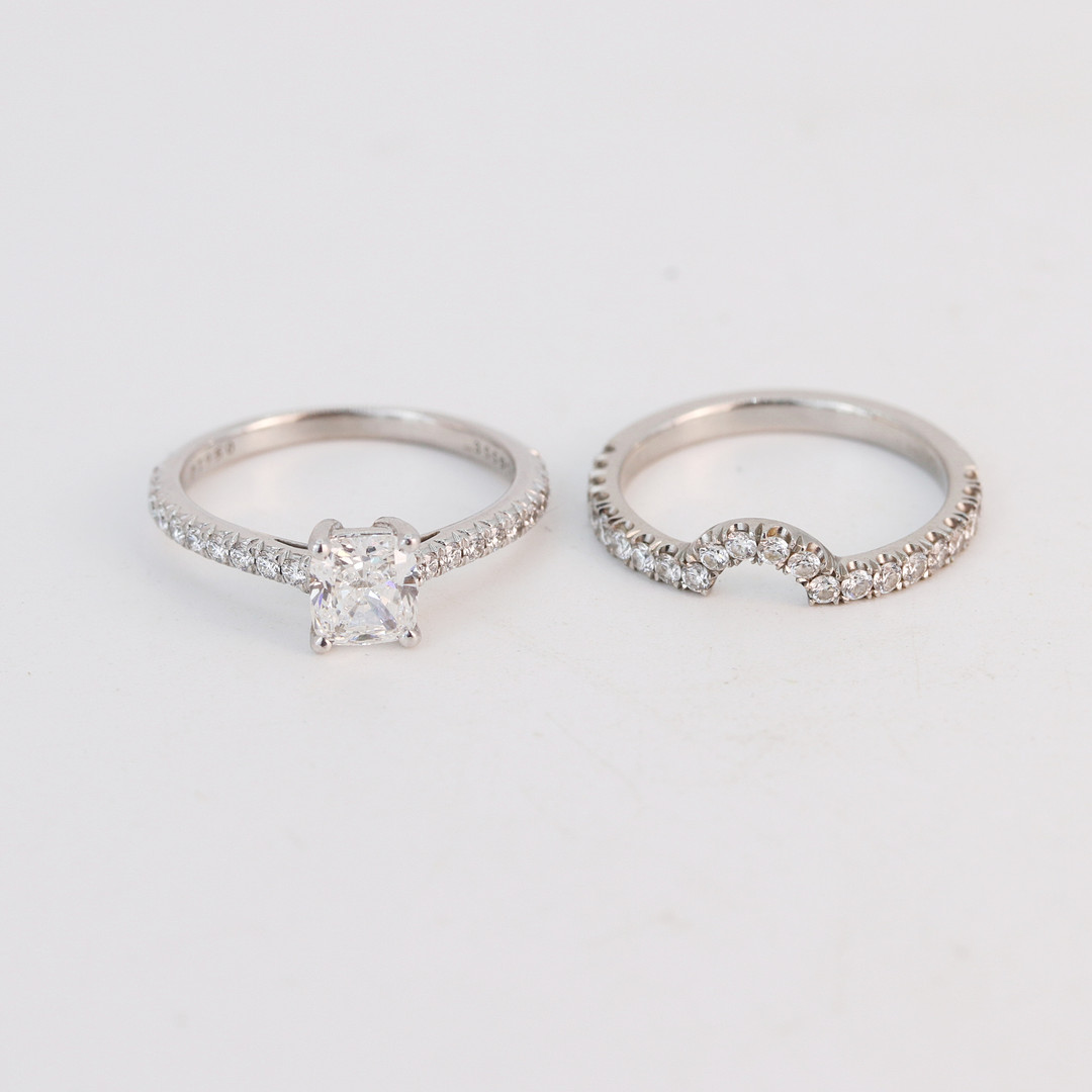 PLATINUM TIFFANY DIAMOND RING AND CAMPANION.